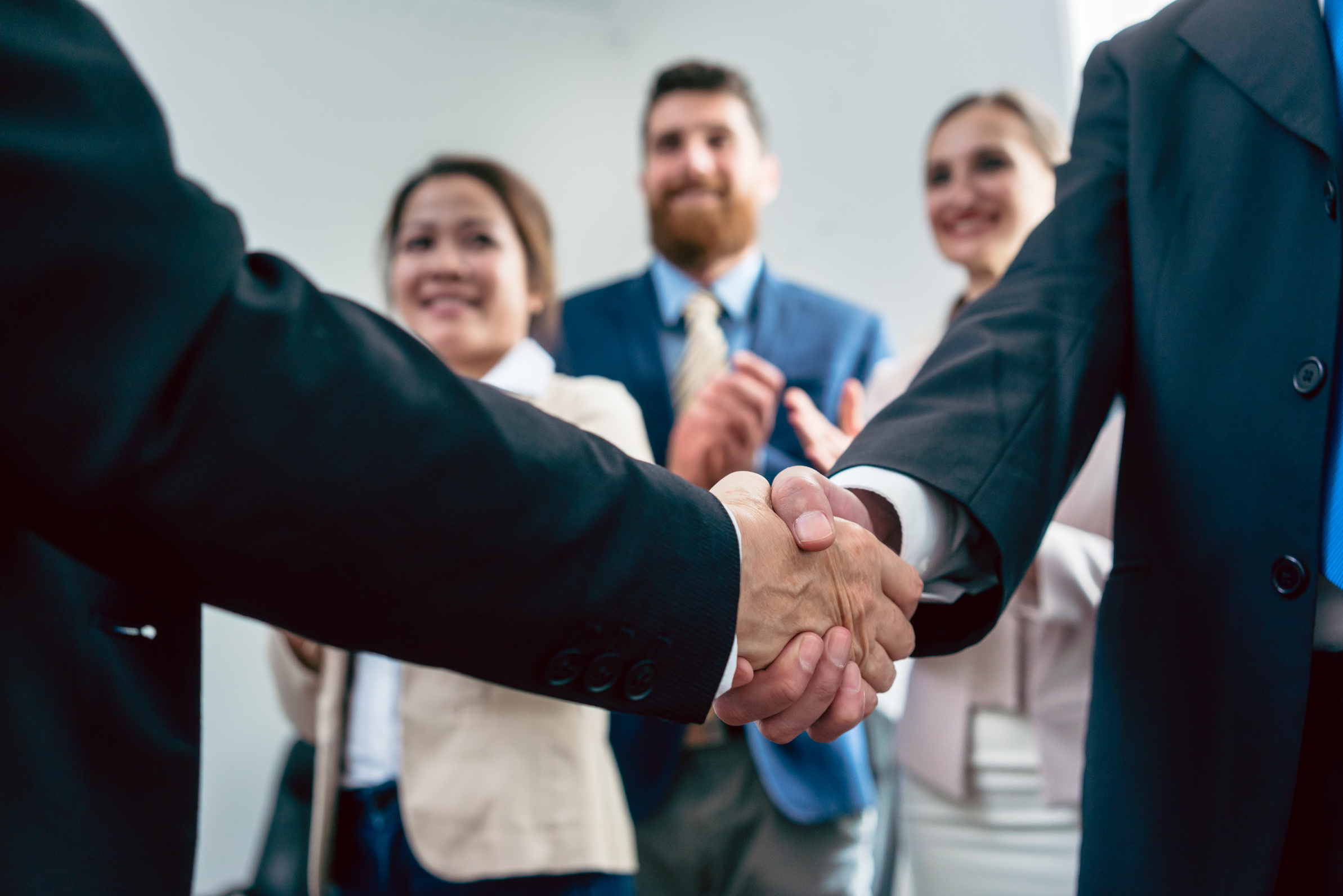 Close-up of the Handshake of Two Business Men after an Important Agreement